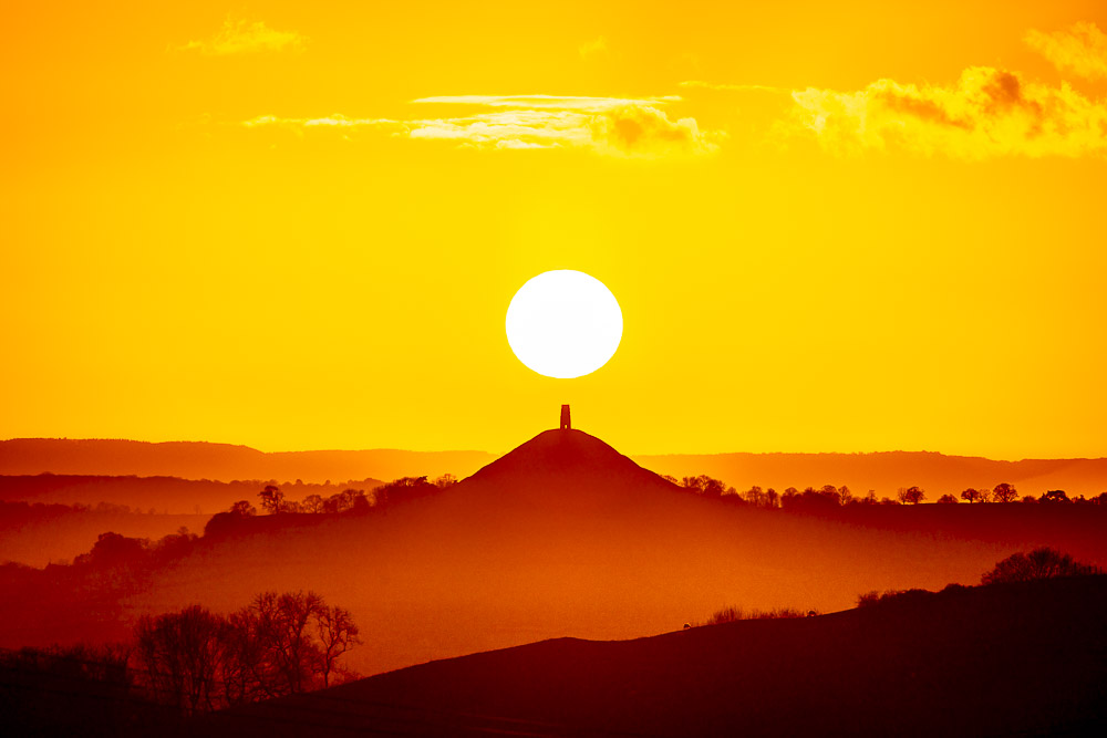 Sunset over Glastonbury Tor - From above Dungeon Farm, Nr Shepton Mallet, Somerset, UK. ID JB_6720
